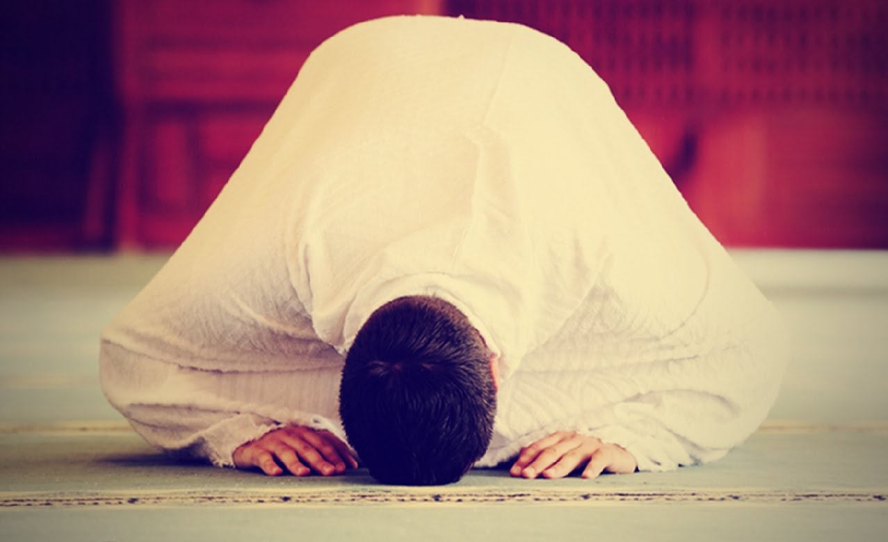 A Muslim man in prostration position