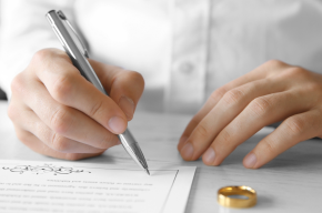 person signing marriage contract-Delaying Marriage in Islam