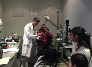 Equipped with translators and specialists, the clinics provide families with an initial eye exam and if they need glasses or a specialist appointments, they get them on the spot. (Laura DaSilva/CBC)