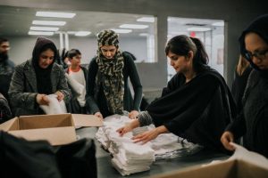 Muslims Give Survival Kits to Dallas Homeless