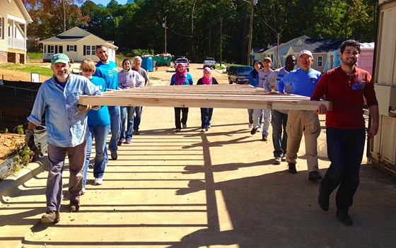 Yusor Abu-Salha, fourth from left, participated in Habitat for Humanity’s 2013-14 Interfaith Build in Apex, N.C. Photo courtesy of Renee Revaz