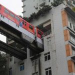 China constructs a monorail through apartments