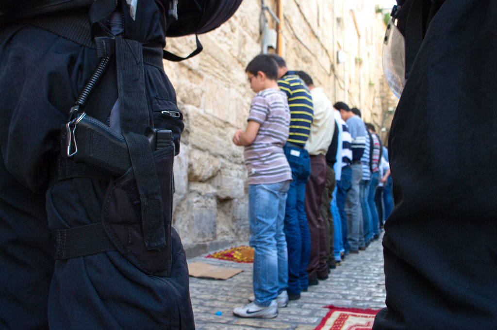 Muslims praying outsite al aqsa mosque
