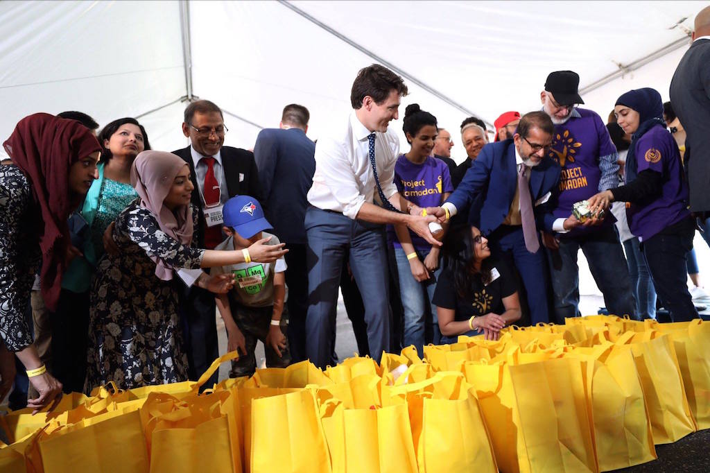 Canadian PM Helps Build Ramadan Food Baskets - About Islam