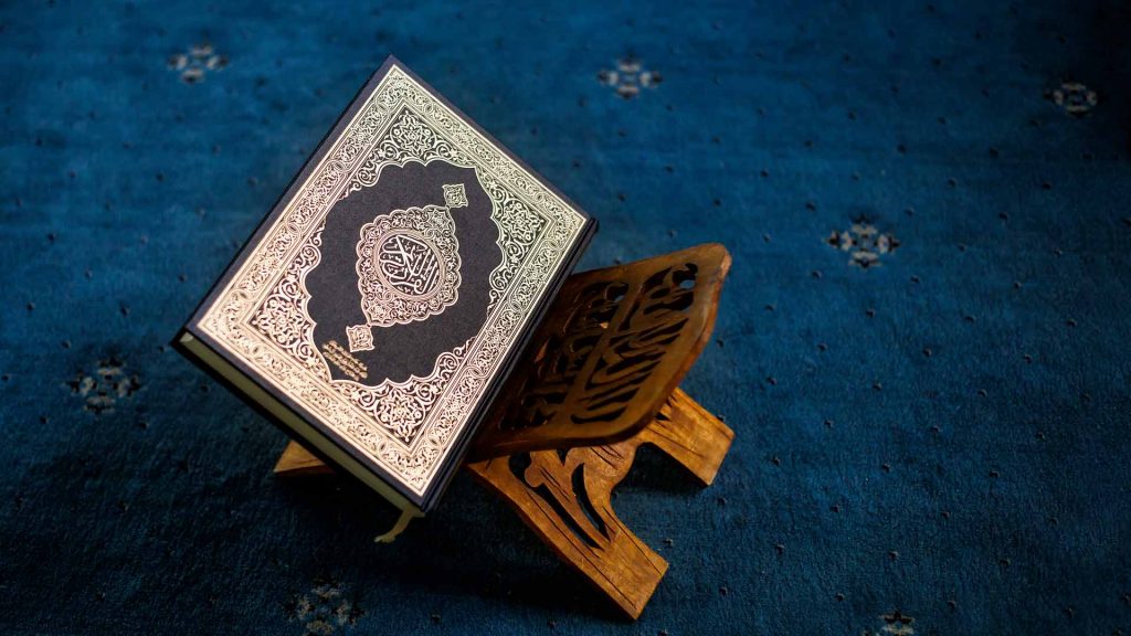 Copy of the Quran on a wooden stand