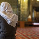 Can a Woman in Her House Follow the Imam of the Mosque?