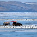 Stunning Photos of Cars Taking Short-cut Across Icy River in Siberia - About Islam