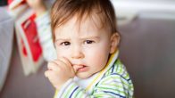 Toddler biting Nails