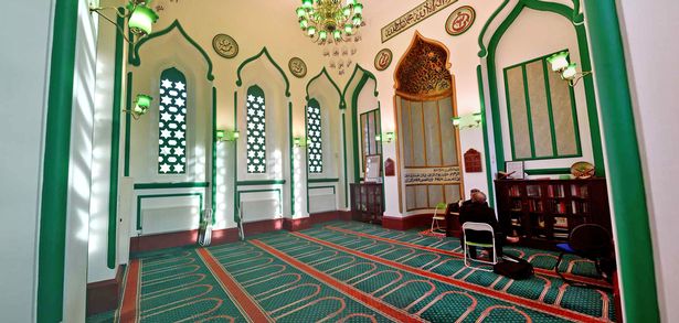 The interior of the main building used as a prayer hall. Shoes must be removed before entering (Image: Surrey Advertiser – Grahame Larter)