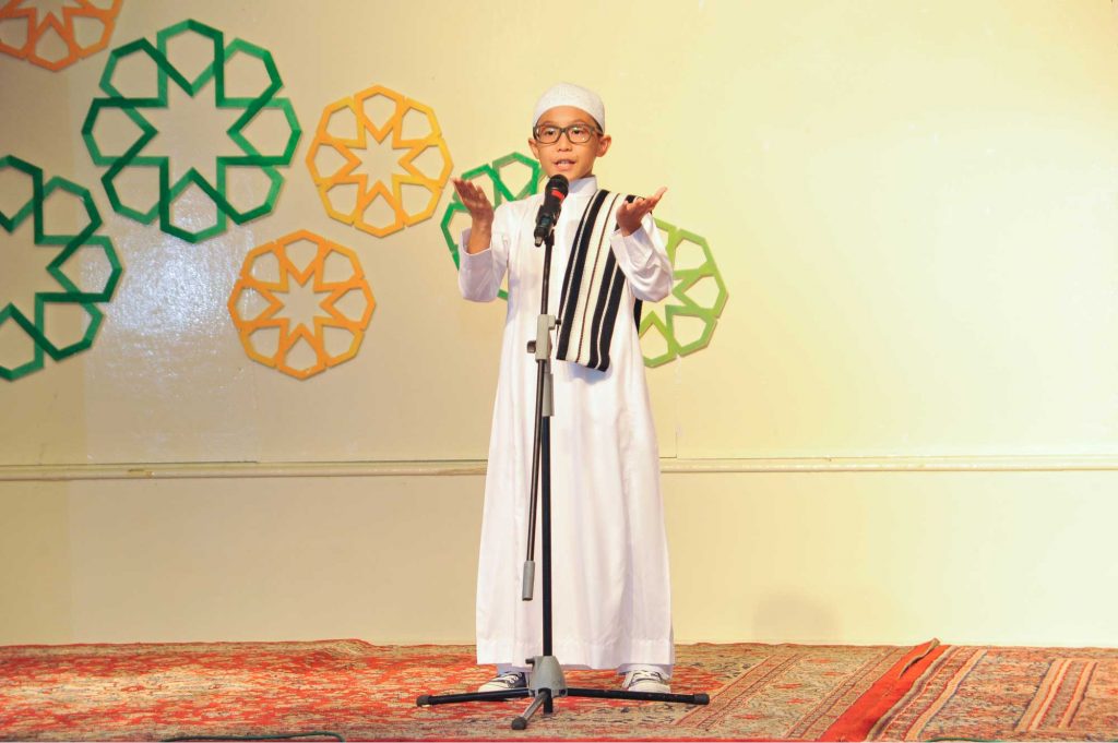 Muslim child giving speech-Can a Son Lead His Mother in Prayer?