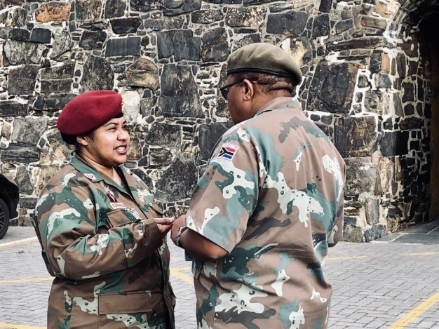 Major Fatima Isaacs and Brigadier General Mafi Mgobozi in conversation outside the military court in Cape Town on Wednesday. (Kamva Somdyala, News24).
