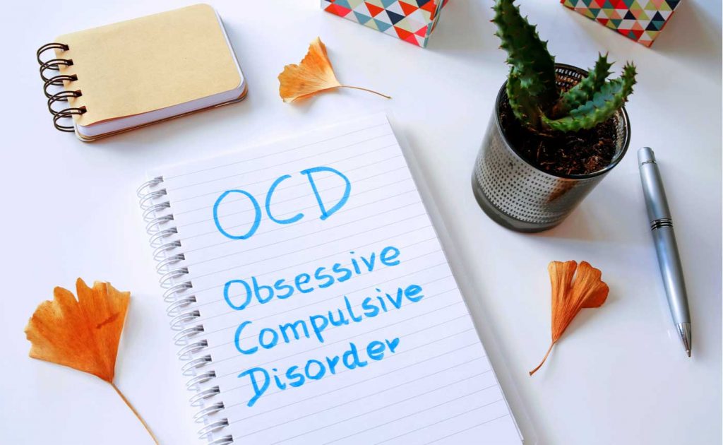 Notebook with 'OCD - Obsessive Compulsive Disorder' written on it-Is Divorce Valid if Issued by an OCD Patient?