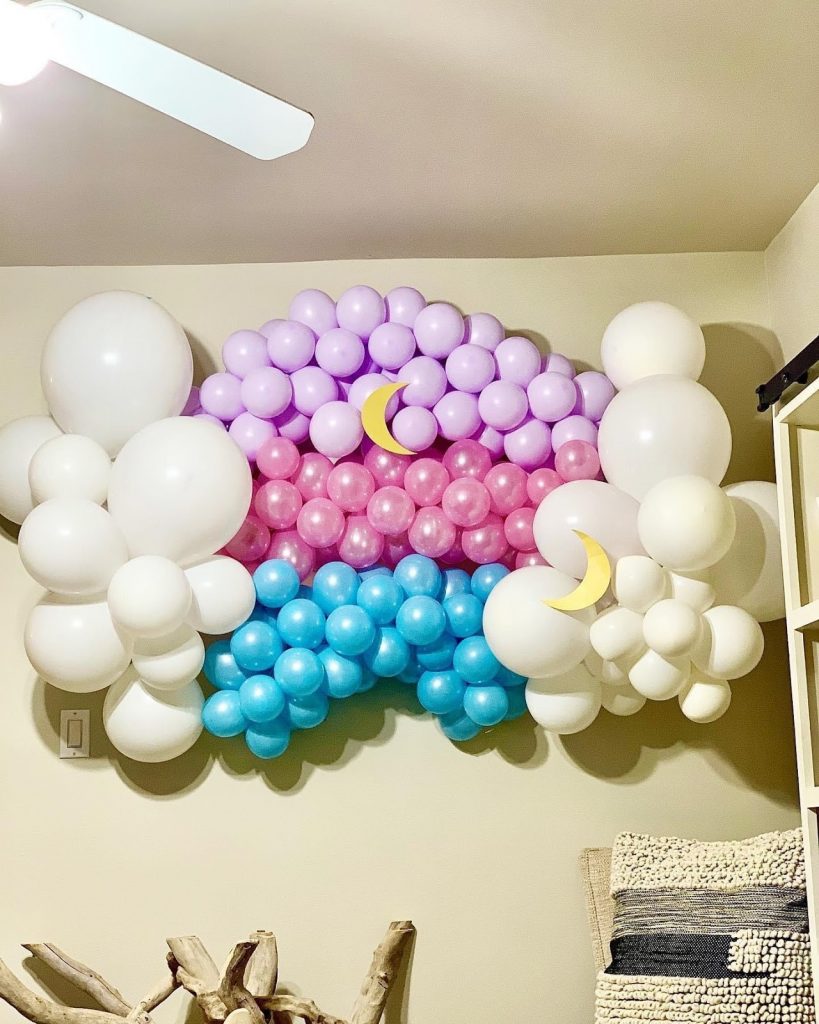 Fatimah Abouharb from New York, NY decorates her living room with balloons and crescent moon cut-outs