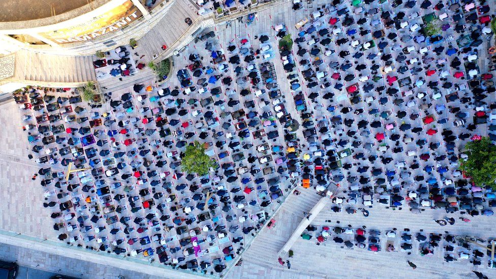But other countries still saw large crowds gather. This image shows prayers in Albania