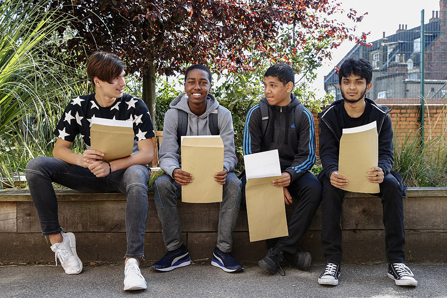 (L-R) Andrei Macsim, 16, Yusuf Salad, 16, Shaheedul Islam, 16, and Mohammed Mojid, 16, at Forrest Gate Community School.