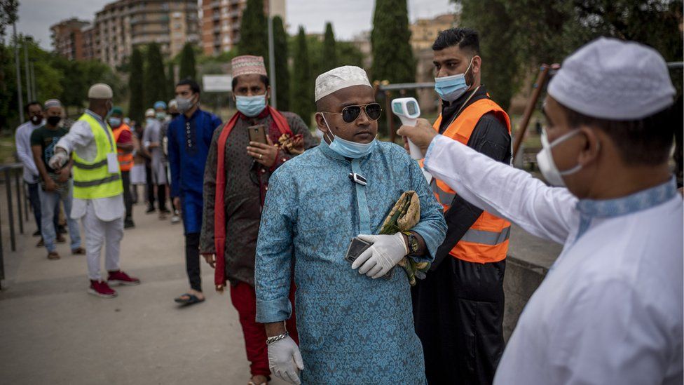 In Rome, staff used thermoscanners to check the body temperature of worshippers