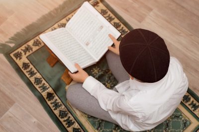 Is Purification a Condition for Touching and Reading the Glorious Quran?