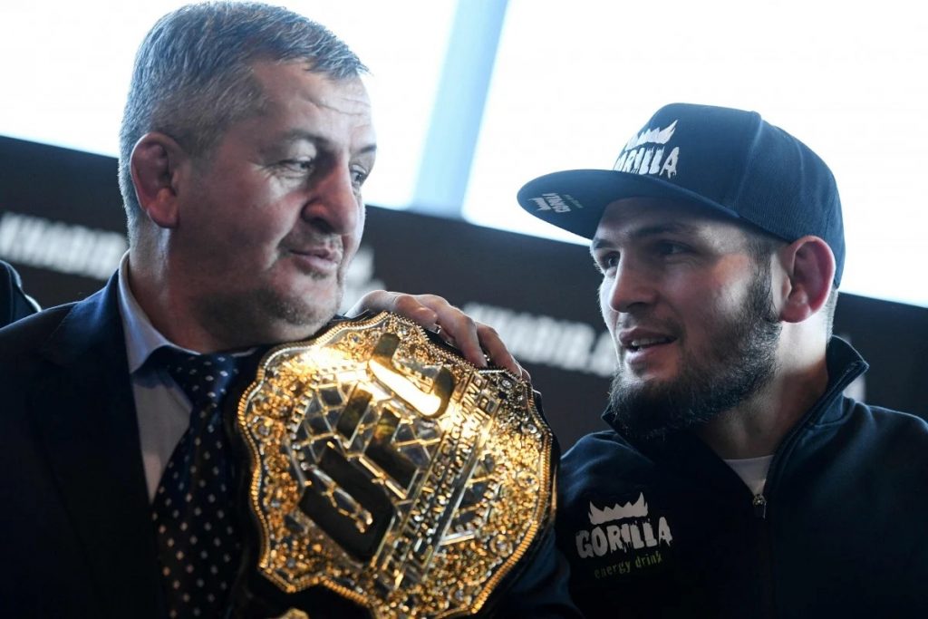 Khabib Nurmagomedov (right) and his father Abdulmanap at a press conference in Moscow. Photo: AFP