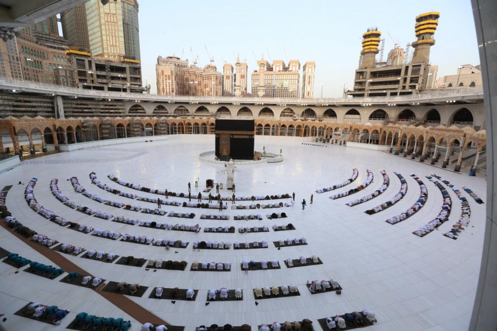 This picture taken early on May 24, 2020 shows worshippers gathering before the Kaabah (AFP)