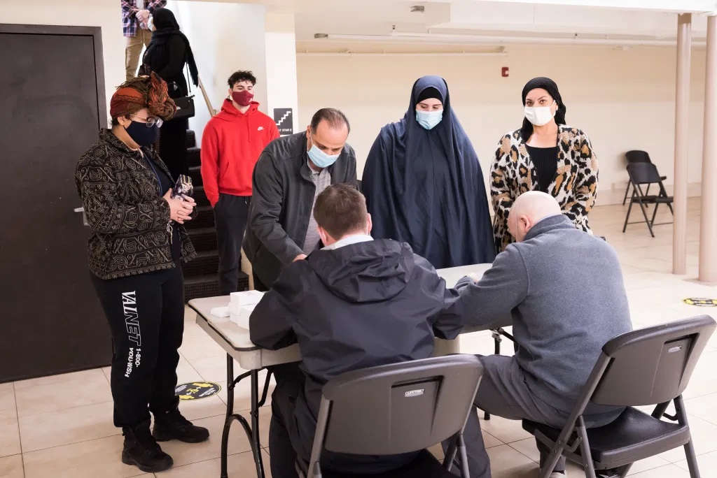 People get vaccinated against COVID-19 at the Blaine Muslim Community Center on Friday, April 2, 2021. Credit: Farraz Currimbhoy | Muslim American Society of Minnesota