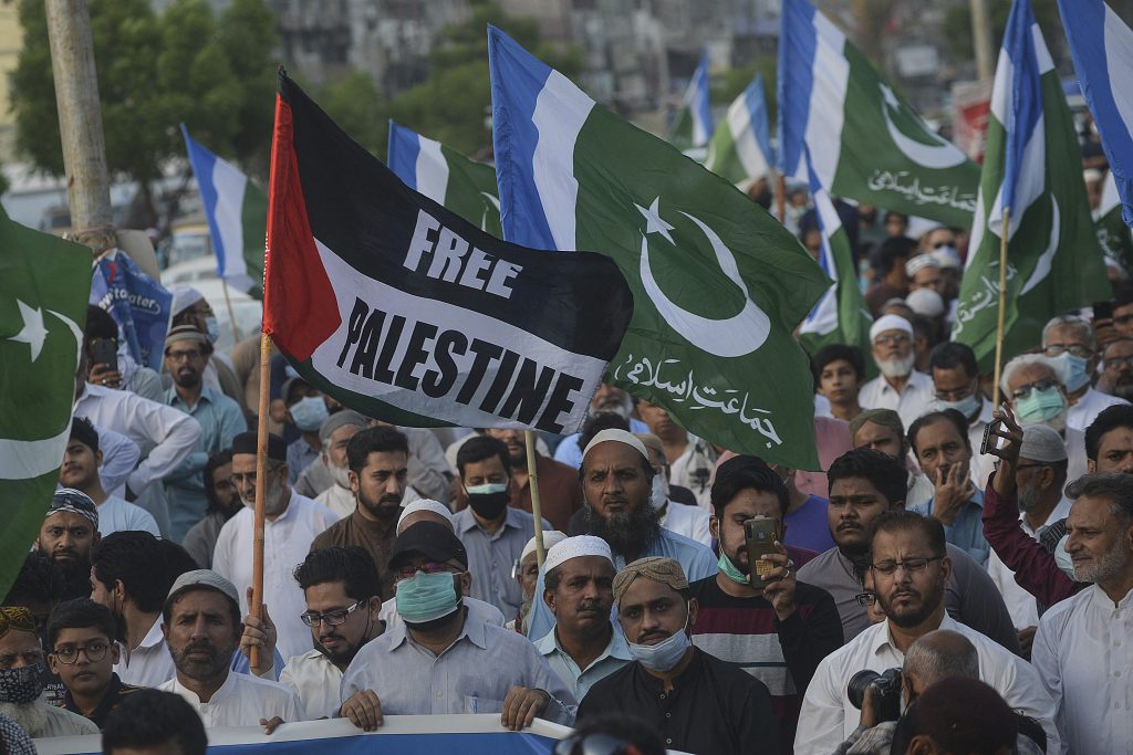 In Karachi, protesters took to the streets to denounce Israel’s deadly air raids on Gaza. [Rizwan Tabassum/AFP]