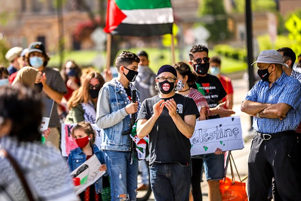 People gather for a Stand in Solidarity with Palestine in Oakland. CP photo: Kayee Orwig