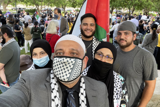 Imam Imad Enchassi and his family at a prayer vigil and rally May 18 in Oklahoma City. Courtesy Imam Imad Enchassi