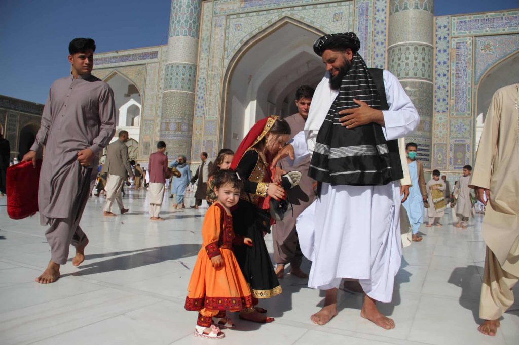 Afghans leave after offering Eid al-Adha prayers at a mosque in Herat, AfghanistanPhotograph: Jalil Rezayee/EPA