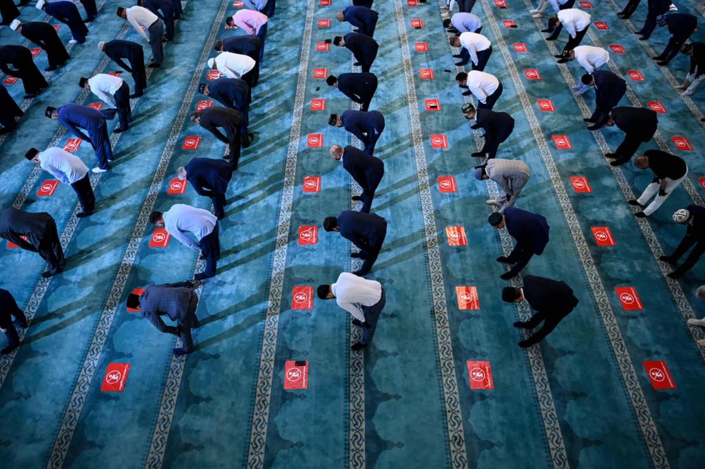 Russian Muslims gather in Moscow Cathedral Mosque during celebrations of Eid al-AdhaPhotograph: Kirill Kudryavtsev/AFP/Getty Images