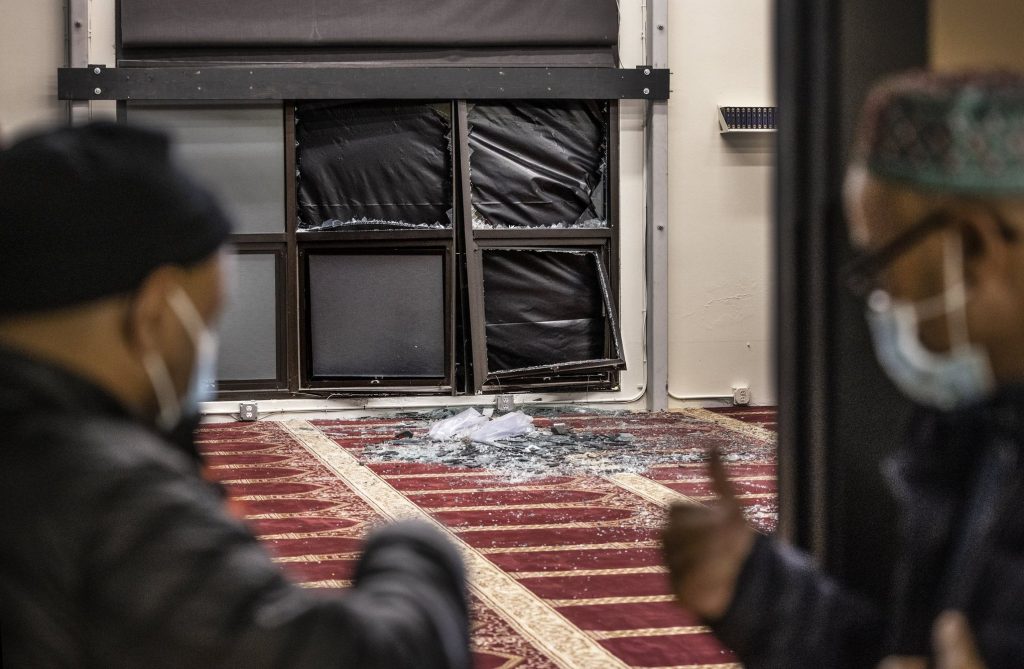 Debris lies inside the prayer space at the Muslim American Youth Foundation in Burien Monday morning. (Steve Ringman / The Seattle Times)