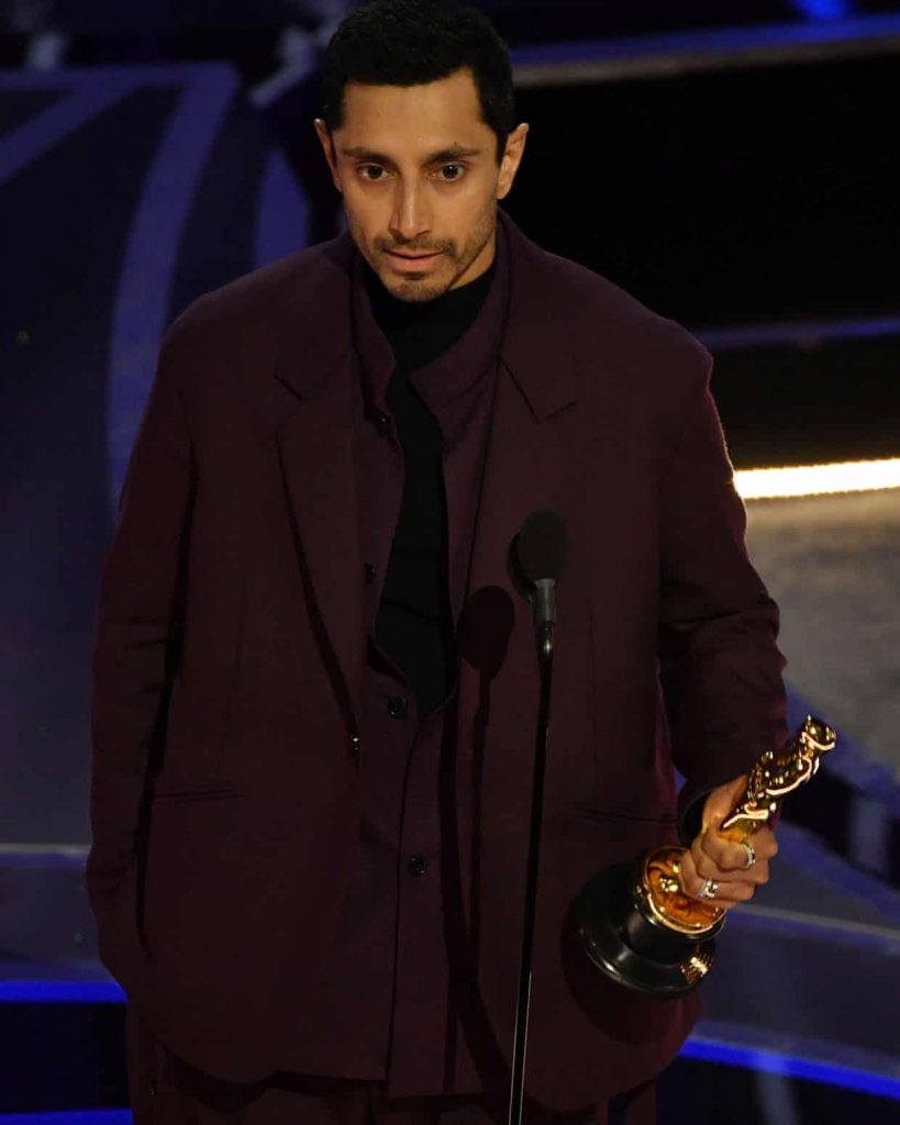 Ahmed accepts his Oscar. Photograph: Robyn Beck/AFP/Getty Images