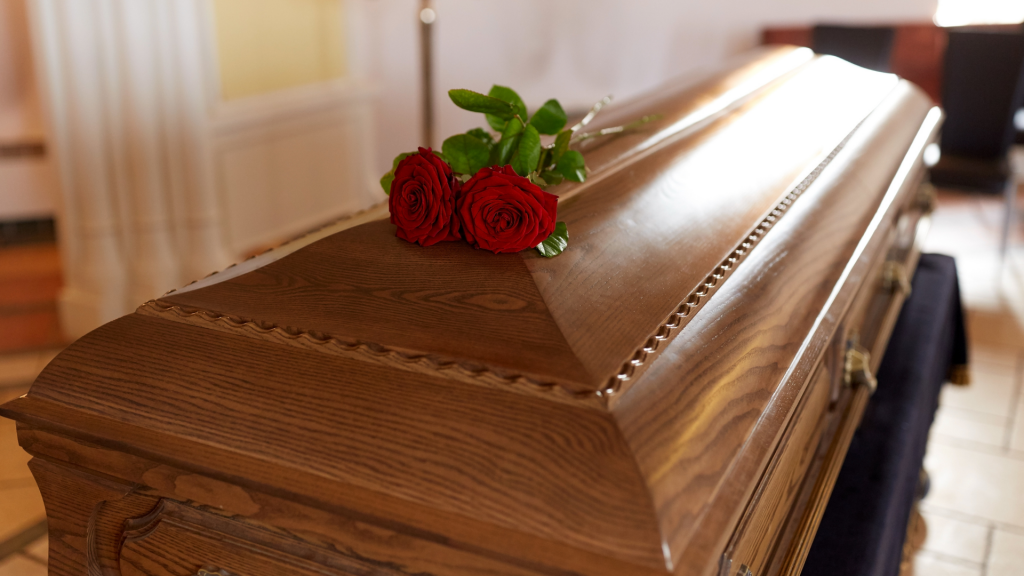 Red Rose Flowers on Wooden Coffin --Husband Washing His Dead Wife: Permissible in Islam?