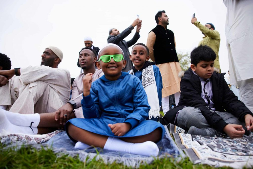 Thousands gather for Eid in the Park in Platt Fields, Manchester
Photograph: Christopher Thomond/The Guardian