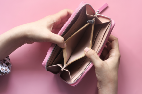 Women Hand Open an Empty Wallet on Pink Background-Can Wife Spend On Parents Without Informing Husband?