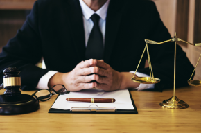 lawyer working on a documents-Can You Become a Lawyer in a Non-Muslim Country?
