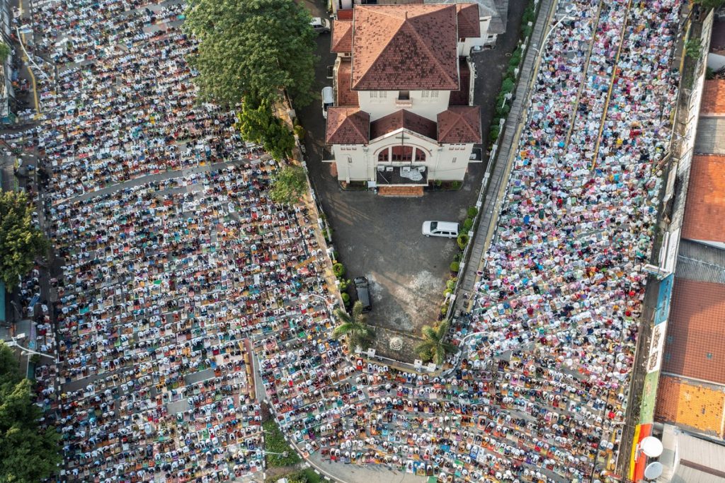 Muslims attend mass prayers on the street during Eid al-Fitr, in Jakarta, Indonesia, on May 2.