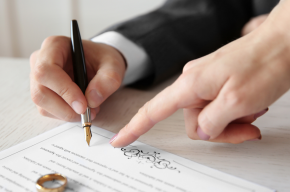 Man Signing a Marriage Contract-Marriage Between Eid al-Fitr and Eid al-Adha