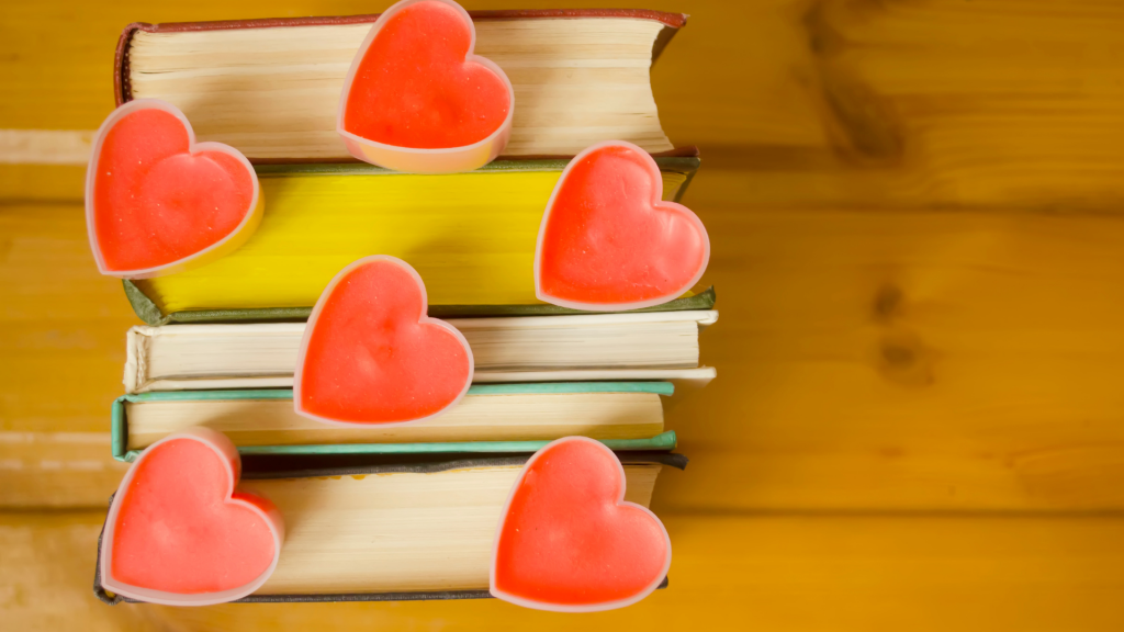 love-hearts-on-books-on-wooden-background-book-lovers-Is Reading Homosexual Romance Books Halal?