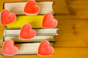 love-hearts-on-books-on-wooden-background-book-lovers-s Reading Homosexual Romance Books Allowed in Islam?