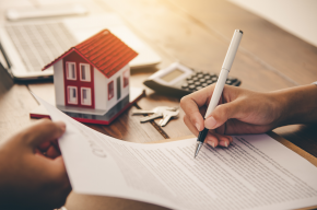 mortgage-signing-contract-Is Working as Mortgage Underwriter Halal?