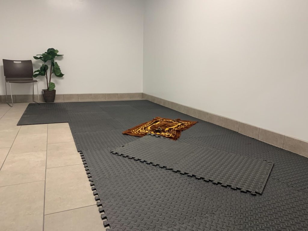 A prayer rug is placed in one of three multi-faith rooms in Amazon’s new warehouse in Woodbury. (KSTP/Ben Henry)