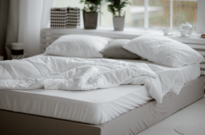 white-bed-with-messy-duvet