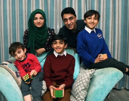 Yusuf Shah with his brothers, Zaki and Khalid, mum Sana and father Irfan (Picture: SWNS)