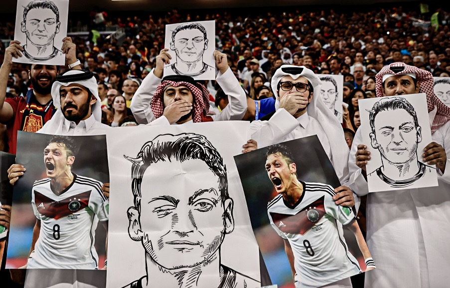 Holding Mesut Ozil Pics, Fans Remind Germany of Racism - About Islam