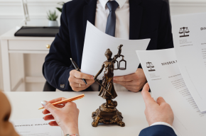 lawyers-looking-at-divorce-paper-Are Women Cursed for Asking for Divorce In Islam?