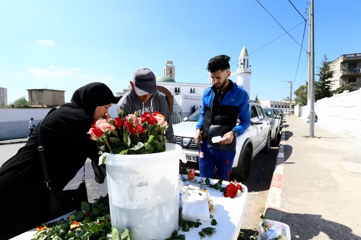 People visit the Sidi Yahya cemetery in Algiers to pray at their relatives' tombs, a tradition after Eid al-Fitr prayer.(Fateh Guidoum/The Associated Press)