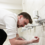 A man making wudu-Obligatory Parts of Wudu