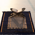 Quran on prayer mat -What Should You Do If You Miss a Prayer?