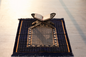 Quran on prayer mat -What Should You Do If You Miss a Prayer?