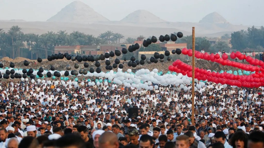 In Egypt, people gathered under balloons in the colours of the Palestinian flag in a show of support for fellow Muslims caught in the Gaza war.
